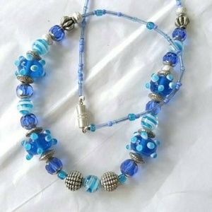 Handmade necklace blue evil eye beads beaded blue silver tone
